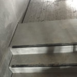 Bijgewerkt bordes betontrap - esthetische betonherstelling